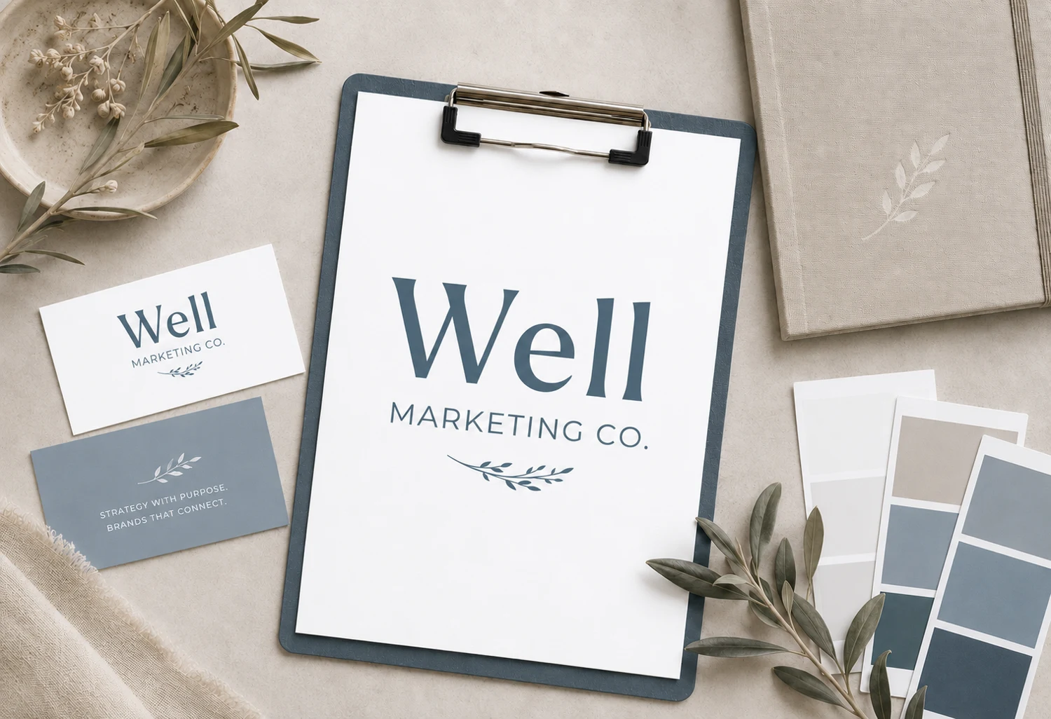 Well Marketing Co. brand stationery, blue and neutral color samples, and botanical details.